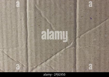 Der Hintergrund aus Wellpappe ist zerknittert. Wellpapier für Verpackungen Stockfoto