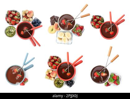 Set mit Fondue-Töpfen mit Schokolade und Früchten auf weißem Hintergrund, Draufsicht Stockfoto