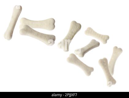 Knochenförmige Kekse für Hunde auf weißem Hintergrund Stockfoto