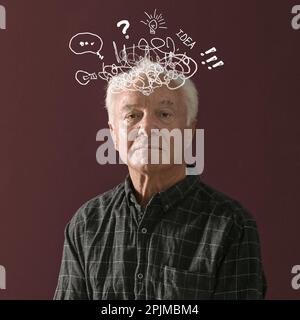Alter Mann mit Demenz auf braunem Hintergrund. Zur Darstellung unangenehmer Gedanken bei kognitiven Störungen Stockfoto