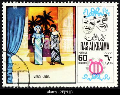 RAS AL-KHAIMAH - CIRCA 1969: Ein in Ras al-Khaimah gedruckter Stempel zeigt Aida von Giuseppe Verdi, Szene aus der Oper, circa 1969 Stockfoto