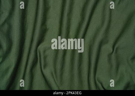 Abstraktes Material, zerknitterter grüner Hintergrund Stockfoto