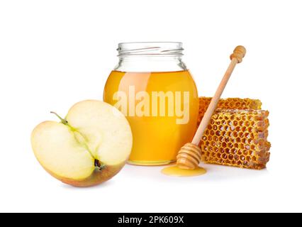 Natürlicher süßer Honig und leckerer frischer Apfel auf weißem Hintergrund Stockfoto