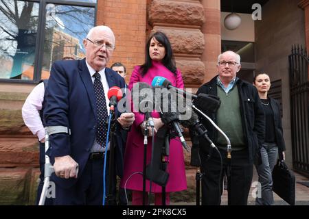 (Von links nach rechts) Eugene Reavey, stellvertretender Direktor von Grainne Teggart Amnesty UK für Nordirland, Gerry McAnespie und Fiona Crowley von Amnesty International sprechen nach einem Treffen mit Tanaiste Micheal Martin vor dem irischen Regierungssekretariat in Belfast zu den Medien. Foto: Donnerstag, 6. April 2023. Stockfoto