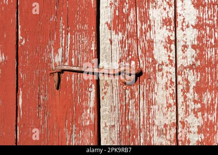 Norwegen, Lofoten, Vestvagoya, Eggum, Bootshaus in typischem Rot, Detail, Haken Stockfoto