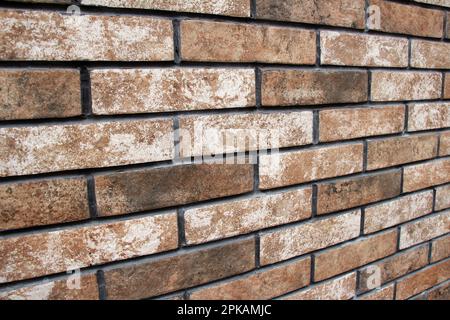 Ein Teil dekorativen Mauerwerks einer Ziegelwand Stockfoto