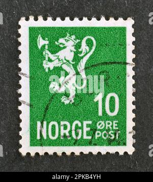 Stempel für annullierte Briefe, gedruckt von Norwegen, auf dem das Wappen steht, ungefähr 1919. Stockfoto