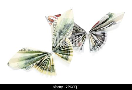 Origami-Schmetterlinge aus Dollar-Banknoten auf weißem Hintergrund Stockfoto