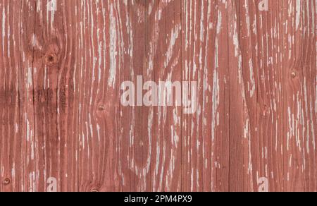 Braune, grungelige Holzwand mit alter abblätternder Farbe, Fotostruktur mit Nahaufnahme im Hintergrund Stockfoto