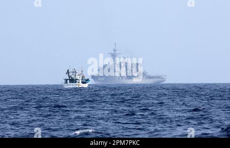 JS Chihaya (background), a submarine rescue ship of Japan Maritime Self ...