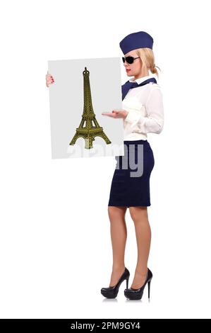 Stewardess hält Plakat mit eiffelturm auf weißem Hintergrund Stockfoto