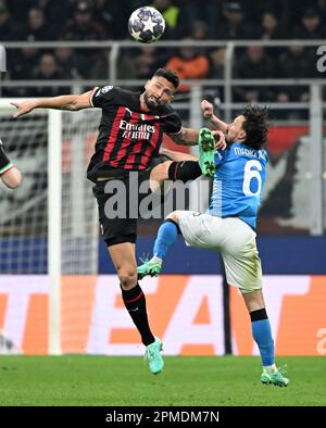 Mailand, Italien. 12. April 2023. Mario Rui (R) aus Neapel tritt am 12. April 2023 beim UEFA Champions League-Viertelfinale der ersten Teilstrecke zwischen dem AC Mailand und Neapel in Mailand, Italien, mit Olivier Giroud von AC Mailand an. Kredit: Augusto Casasoli/Xinhua/Alamy Live News Stockfoto
