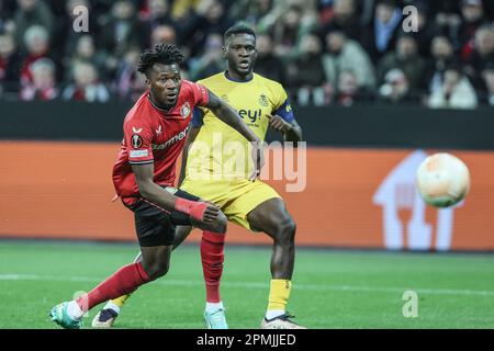 Leverkusen, Deutschland. 13. April 2023. Victor Boniface von Union erzielt ein Tor bei einem Fußballspiel zwischen dem deutschen Bayer 04 Leverkusen und der belgischen Royale Union Saint-Gilloise, dem ersten Spiel des Viertelfinals der UEFA Europa League, am Donnerstag, den 13. April 2023 in Leverkusen. BELGA FOTO BRUNO FAHY Kredit: Belga News Agency/Alamy Live News Stockfoto