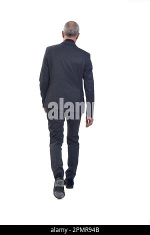 Rückansicht eines Mannes mit Anzug auf weißem Hintergrund Stockfoto