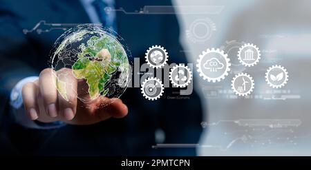 Geschäftsmann, der die globale Ikone berührt, reduziert den CO2-Ausstoß CO2-Fußabdruck Klimawandel.Nachhaltige Entwicklung und Innovation umweltfreundliches Geschäftskonzept. Stockfoto