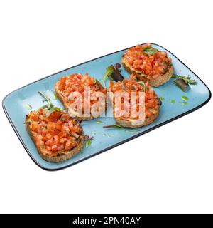 Restaurant, Abendessen, Vorspeisenmenü, Tomatenbruschetta mit Basilikum und Olivenöl Stockfoto
