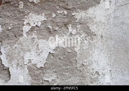 Textur, verputzte Hauswand, abblätternde Farbe Stockfoto