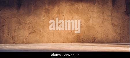 Grober strukturierter Steinhintergrund in warmen Sonnenlichttönen Stockfoto