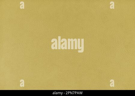 Texturhintergrund gelber Velours-Stoff, der wie eine Lederoberfläche strukturiert ist. Textilstruktur Nahaufnahme Polstermöbel Textilmaterial, Design in Stockfoto
