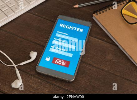 Registrieren Sie sich jetzt als Mitgliedsantrag auf einem mobilen Smartphone, Business Concept. Weichzeichner. Stockfoto