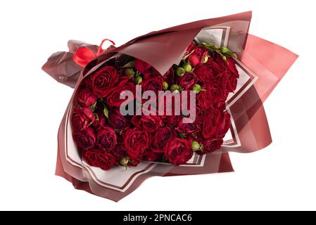 Farbenfroher Blumenstrauß aus roten Rosen auf weißem Hintergrund. Speicherplatz kopieren. Stockfoto