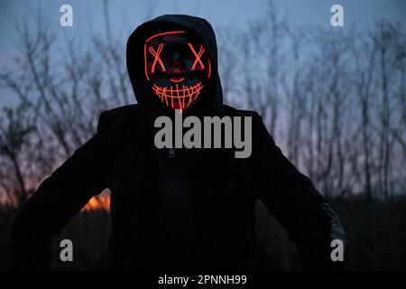 Purge Mask, man with LED Mask, Frankfurt am Main, Hessen, Deutschland Stockfoto