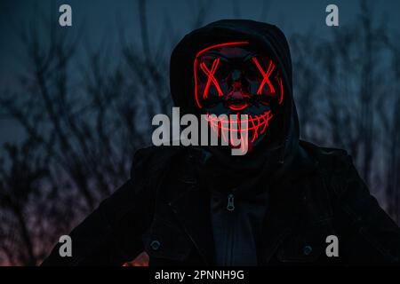 Purge Mask, man with LED Mask, Frankfurt am Main, Hessen, Deutschland Stockfoto