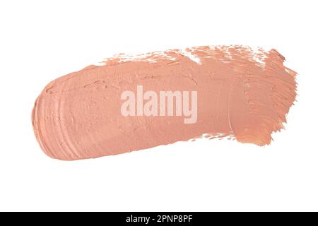 Abstrich und Textur von cremefarbenem Lippenstift oder Acrylfarbe, isoliert auf weißem Hintergrund. Stockfoto