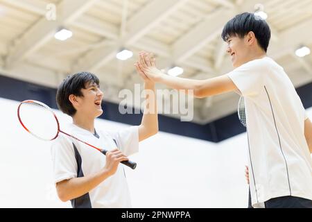 High-Fiving-Schüler Stockfoto