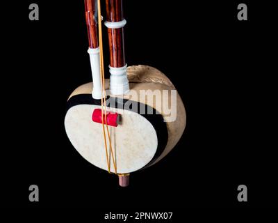 Nahaufnahme des thailändischen Fidel Bass-Musikinstruments Stockfoto