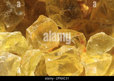 Gelbe Zitrinstruktur als natürlicher mineralischer Hintergrund Stockfoto