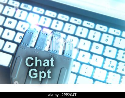 Florenz , Italien April 19. 2023. ChatGPT-Neonlicht-Schildkonzept, Open-ai-Chat-gpt-bot und künstliche Intelligenz-Technologie. Roboterhand tippt auf c Stockfoto