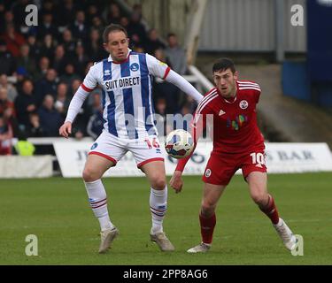 Hartlepool, Großbritannien. 22. April 2023. Callum Cooke von Hartlepool United in Aktion mit Ashley Nadesan von Crawley Town während des Spiels der Sky Bet League 2 zwischen Hartlepool United und Crawley Town im Victoria Park, Hartlepool, am Samstag, den 22. April 2023. (Foto: Mark Fletcher | MI News) Guthaben: MI News & Sport /Alamy Live News Stockfoto