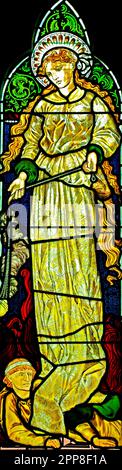 Charitas, Charity, Buntglasfenster, von Burne-Jones, 1865, Sculthorpe Church, Norfolk, England, aus dem Fenster "Faith Hope and Charity" Stockfoto