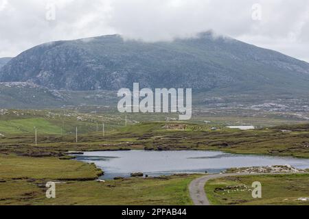 Blick von Àird Mhòr Mhangarstaidh nach Loch Dubh Druim na h-Àirde und Mealaisbhal, Isle of Lewis, Äußere Hebriden, westliche Inseln, Schottland, Vereint Stockfoto