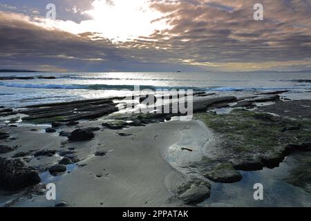 Sonnenlicht am Duntulm Beach, Isle of Skye, Schottland, Großbritannien. Stockfoto