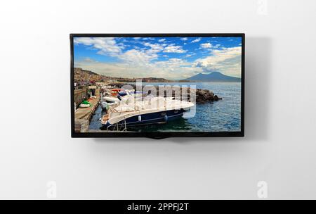 TV-Monitor an der Wand Stockfoto