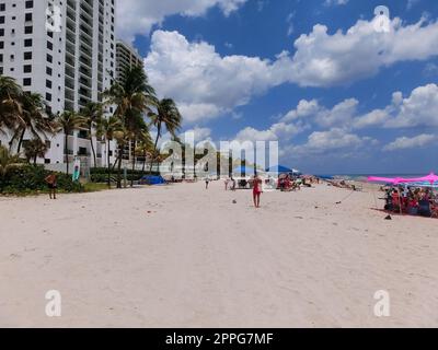 Die Leute, die sich in South Beach, Miami, Florida, ausruhen. Stockfoto