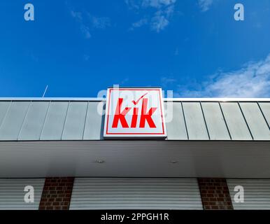 Kiel, Germany - 20.August 2022: Sign of the textile discounter Kik at the entrance of a market. Stockfoto