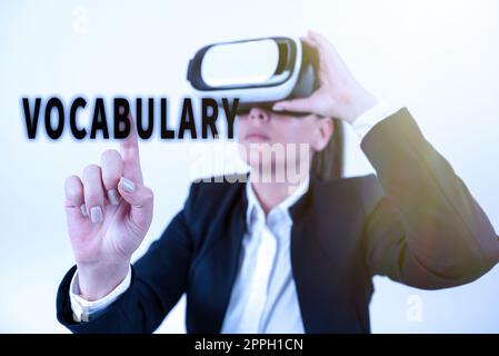 Textvokabular wird geschrieben. Wort, das auf einer Sammlung von Wörtern und Phrasen geschrieben wird, die alphabetisch angeordnet und erklärt oder definiert sind Stockfoto