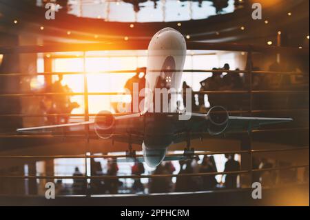 Doppelbelastung von Geschäftsreisen und Flugzeugen Stockfoto