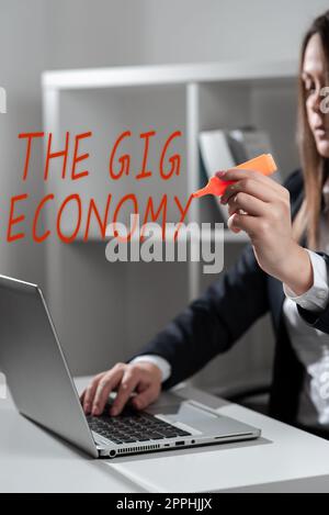 Schild mit der Aufschrift „Gig Economy“. Internet-Konzept Markt für befristete Arbeitsverträge Freiberufler Zeitarbeit Stockfoto