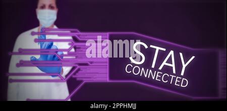 Handgeschriebenes Schild bleibt verbunden. Geschäftskonzept, um miteinander zu kommunizieren und in Kontakt zu bleiben Stockfoto