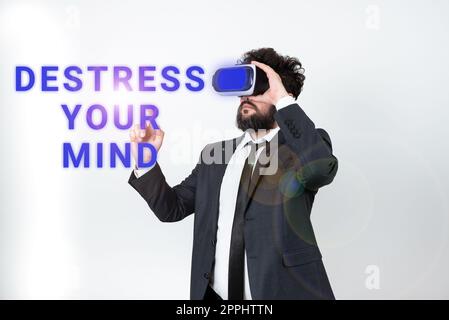 Handschriftliches Zeichen Destress Your Mind. Ein Wort, das mentale Spannungen löst, Stress abbaut Stockfoto