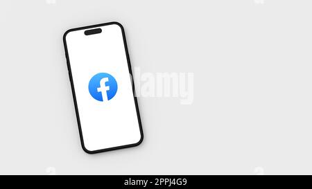 Facebook-Logo auf Smartphone-Bildschirm auf hellgrauem Hintergrund mit Copy Space Stockfoto