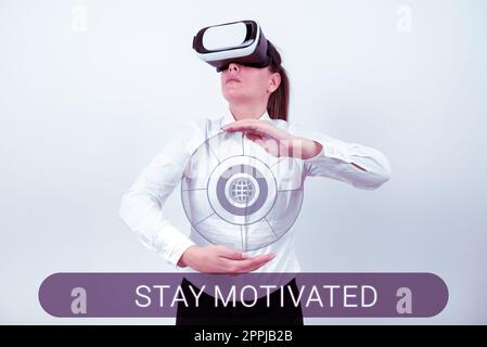 Handgeschriebener Text bleibt motiviert. Business Concept Belohnen Sie sich jedes Mal, wenn Sie ein Ziel mit Wissen erreichen Stockfoto