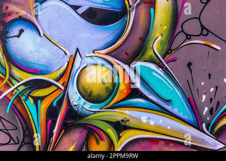 Abstraktes Graffiti an der Wand gerahmt Stockfoto