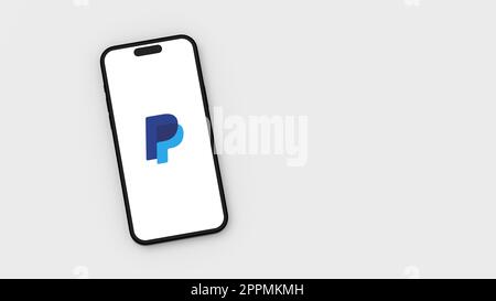 PayPal-Logo auf dem Bildschirm des Mobiltelefons auf grauem Hintergrund mit Kopierbereich Stockfoto