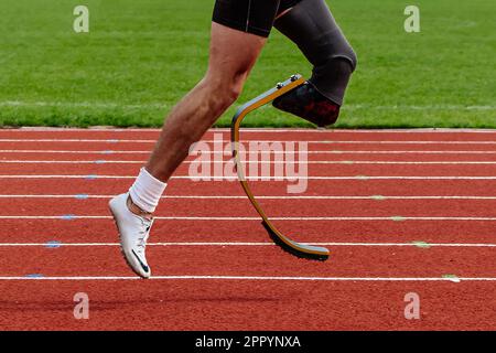 Beine Läufer para-athlete auf Nike Spikes Schuhe Laufbahn Stadion, Sommer para-athletics Meisterschaften Stockfoto