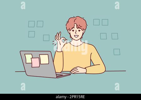Ein lächelnder Mann zeigt Daumen hoch, wenn er an einem Laptop arbeitet Stock Vektor